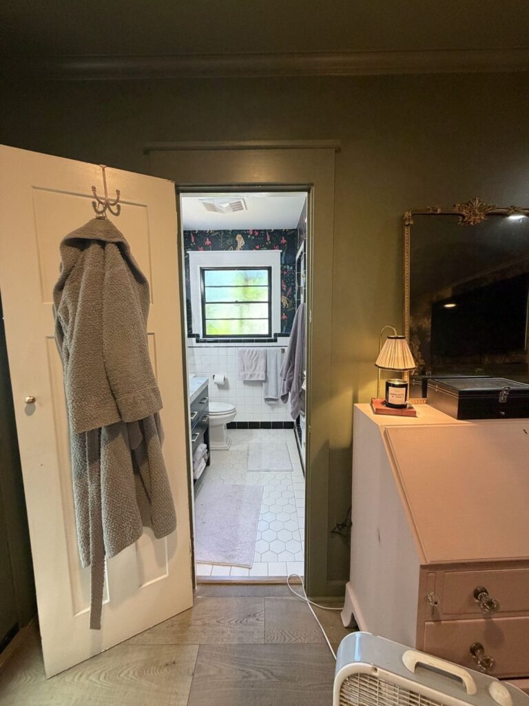 Before: view into the original bathroom from the green bedroom